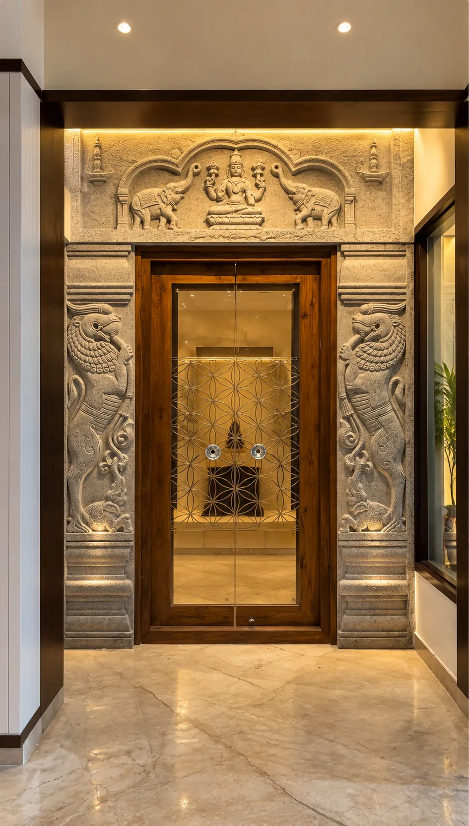 Stone-carved entrance detailing on an SJ Infra project